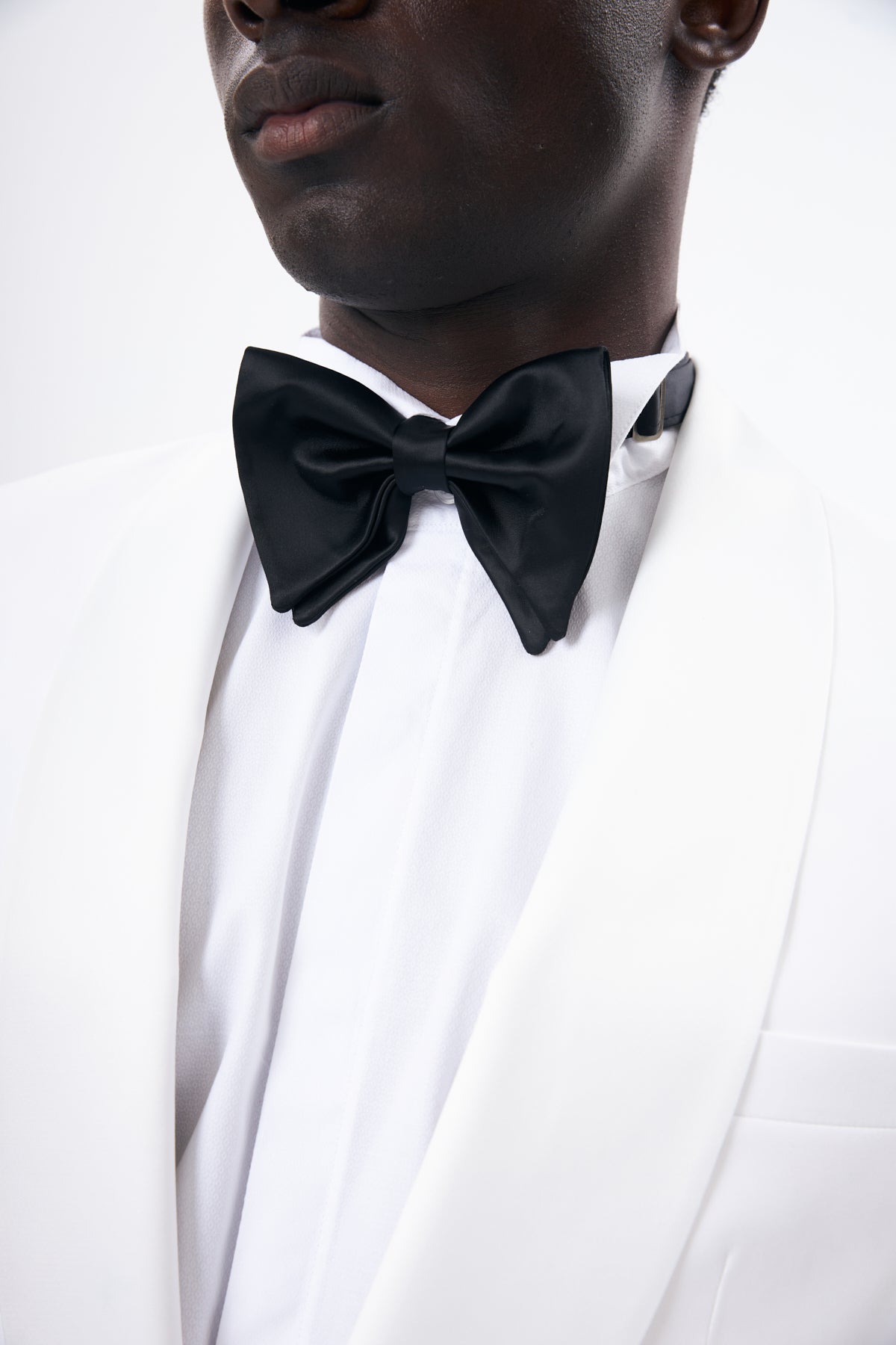 White Tuxedo with Black Trousers