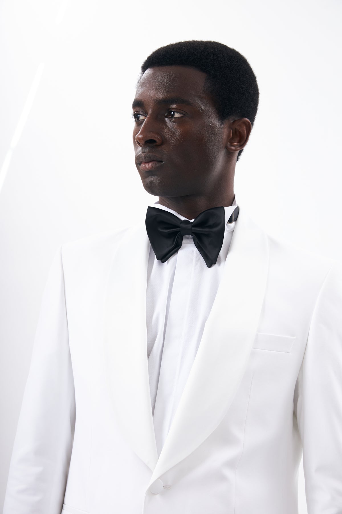 White Tuxedo with Black Trousers